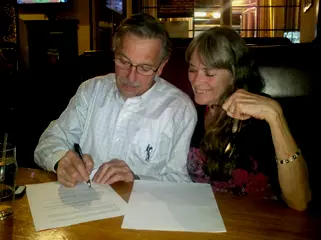 George and Lesley Lathrop signing over Silhouette to Troy Reit - March 2015